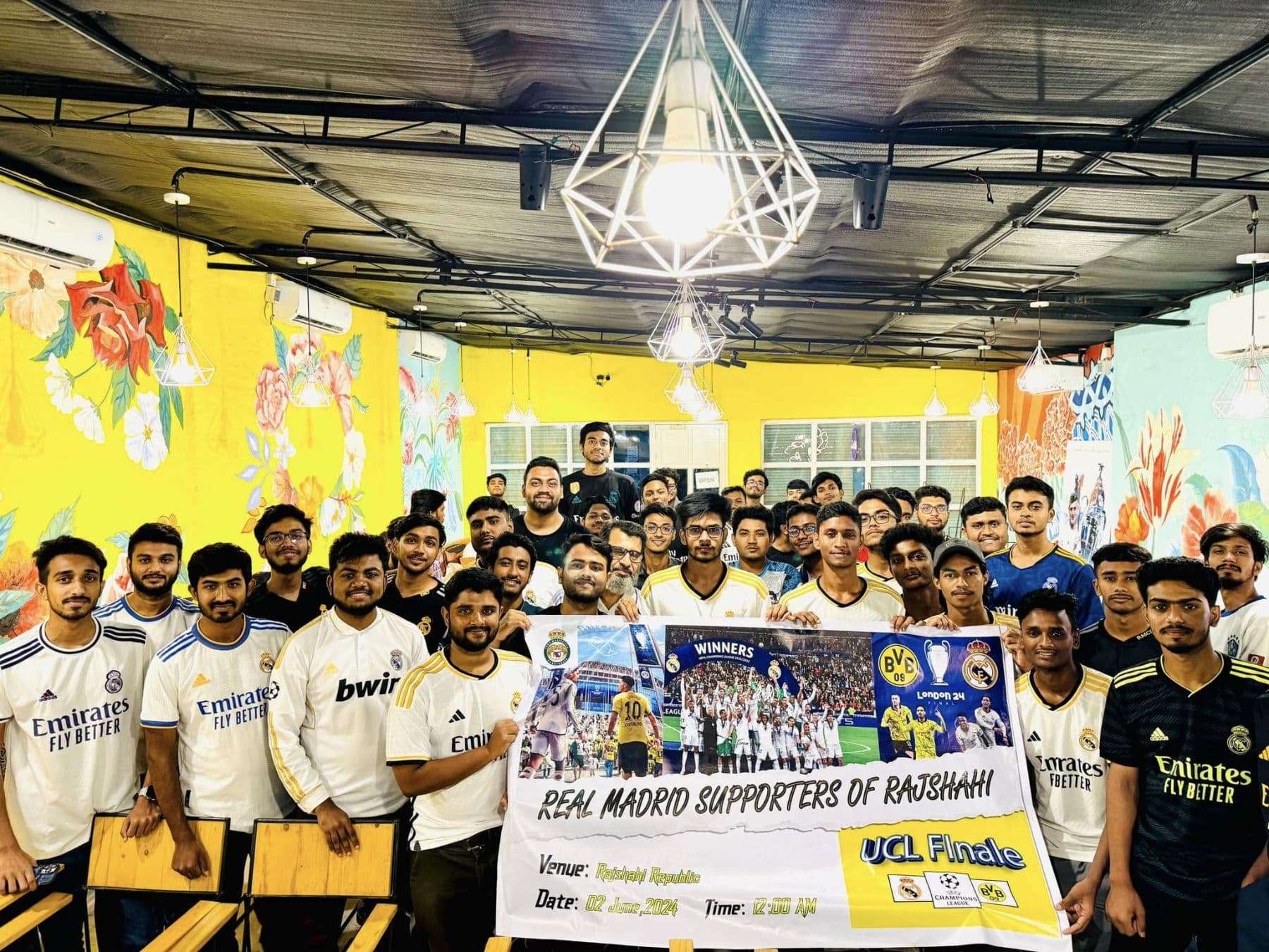 Real Madrid supporters in Rajshahi holding a banner at the 2024 Champions League final screening